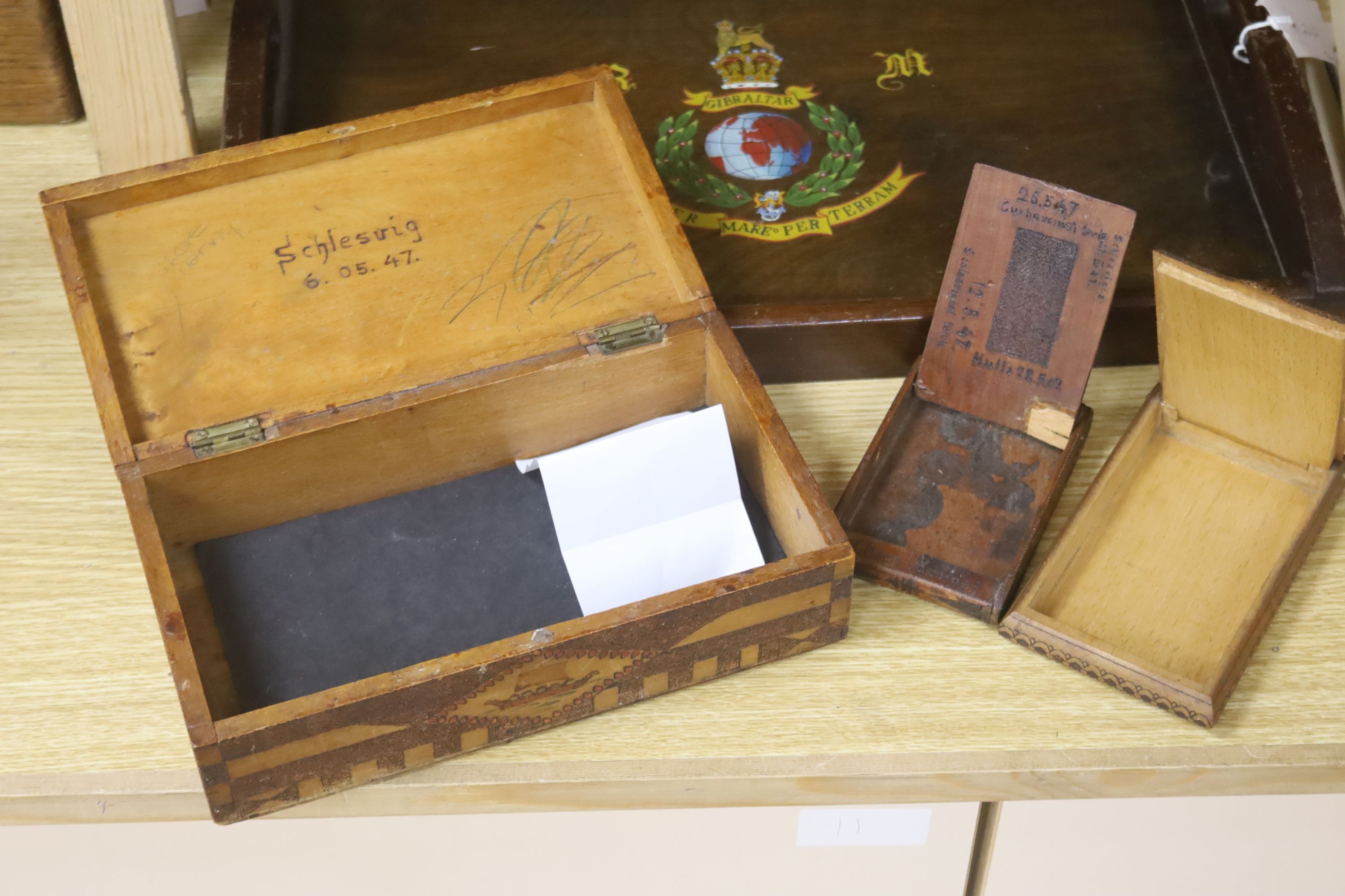 A tray with WWII Gibraltar interest, and three boxes made by displaced WWII Estonians, 48 x 32cm